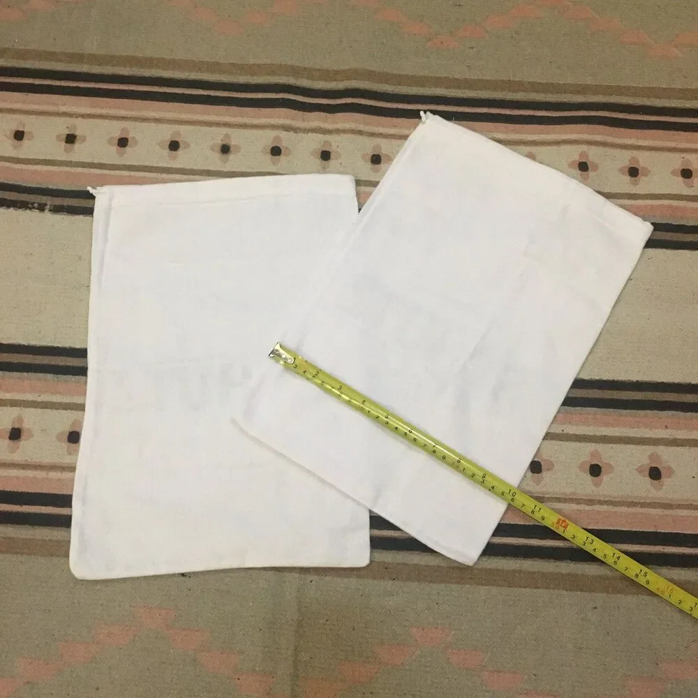Two (2) Schutz white w/ black lettering soft material Dust bag 15” x 10” garment